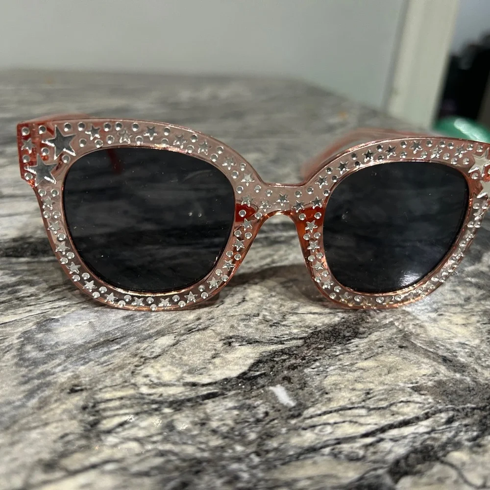 Stylish Pink Sunglasses with Star Accents